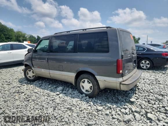 2001 Chevrolet Astro with VIN 1GNEL19W31B117661, listed as a Copart auction lot 63974265 with Not provided miles and Salvage title. Bid and sale history available at DreamBid. Image 2.