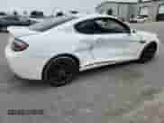 2007 Hyundai Tiburon GT с VIN KMHHN66F47U249354, выставлен на аукционе Copart как лот 69979965 с пробегом 168 813 миль миль и Списание • Salvage title. История ставок и продаж доступна на DreamBid. Изображение 3.