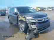 2022 Honda Pilot Elite z VIN 5FNYF6H0XNB014165, wystawiony jako IAAI lot #41196850 z przebiegiem 107 032 mil mil oraz . Historia ofert i sprzedaży dostępna na DreamBid. Obrazek 1.