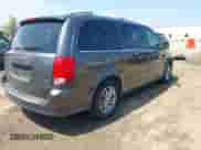 2014 Dodge Grand Caravan SXT with VIN 2C4RDGCG1ER366222, listed as a IAAI auction lot 42454269 with 133,796 mi miles and . Bid and sale history available at DreamBid. Image 4.