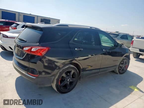 2020 Chevrolet Equinox Premier with VIN 2GNAXNEV3L6249669, listed as a Copart auction lot 84013405 with 84,061 mi miles and Salvage title. Bid and sale history available at DreamBid. Image 3.
