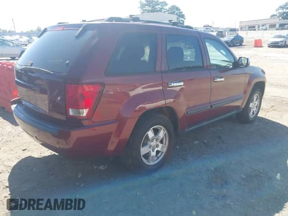 2007 Jeep Grand Cherokee Laredo z VIN 1J8GS48K67C549614, wystawiony jako IAAI lot #43359923 z przebiegiem 254 399 mil mil oraz . Historia ofert i sprzedaży dostępna na DreamBid. Obrazek 4.