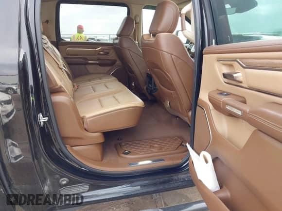 2019 Ram 1500 Longhorn with VIN 1C6SRFKT7KN518337, listed as a IAAI auction lot 41502569 with 76,226 mi miles and . Bid and sale history available at DreamBid. Image 8.