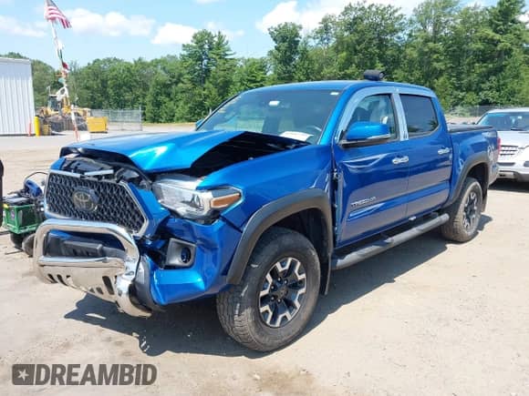 2018 Toyota Tacoma SR z VIN 3TMCZ5AN0JM126724, wystawiony jako IAAI lot #42842788 z przebiegiem 91 776 mil mil oraz . Historia ofert i sprzedaży dostępna na DreamBid. Obrazek 17.