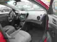 2012 Chevrolet Sonic LS with VIN 1G1JB6SHXC4114498, listed as a IAAI auction lot 42091500 with 128,638 mi miles and . Bid and sale history available at DreamBid. Image 5.