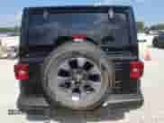 2021 Jeep Wrangler Unlimited Sahara Altitude with VIN 1C4HJXEG1MW605811, listed as a Copart auction lot 63214275 with 81,473 mi miles and Salvage title. Bid and sale history available at DreamBid. Image 6.