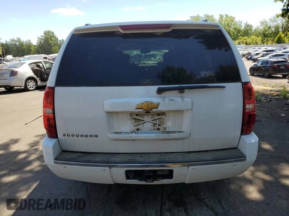 2013 Chevrolet Suburban LTZ с VIN 1GNSKKE7XDR183758, выставлен на аукционе Copart как лот 63390323 с пробегом 127 433 миль миль и Списание • Salvage title. История ставок и продаж доступна на DreamBid. Изображение 6.