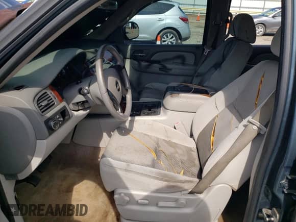 2009 Chevrolet Suburban 2LT с VIN 1GNFC26J19R180232, выставлен на аукционе Copart как лот 63379485 с пробегом Не указан миль и Списание • Salvage title. История ставок и продаж доступна на DreamBid. Изображение 7.