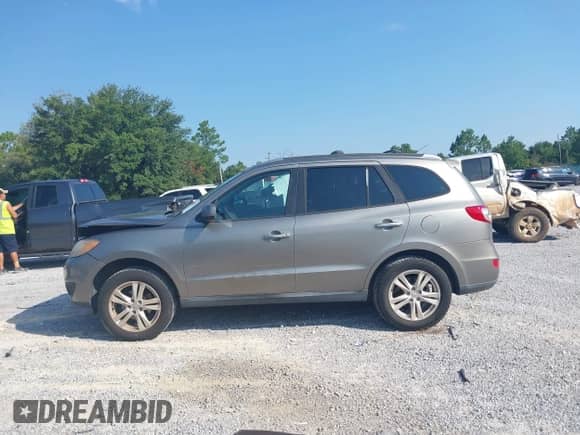 2011 Hyundai Santa Fe Limited with VIN 5XYZK4AG8BG001950, listed as a IAAI auction lot 42869271 with 115,265 mi miles and . Bid and sale history available at DreamBid. Image 15.