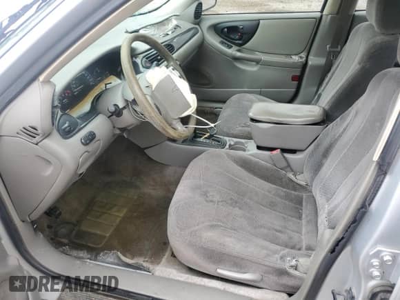 2004 Chevrolet Malibu Classic z VIN 1G1ND52F74M545029, wystawiony jako Copart lot #52122365 z przebiegiem 193 441 mil mil oraz Szkoda całkowita • Salvage title. Historia ofert i sprzedaży dostępna na DreamBid. Obrazek 7.