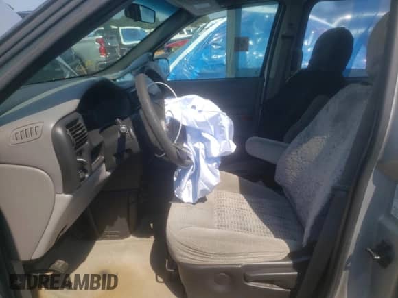 2003 Chevrolet Venture Y3G Mobility with VIN 1GNDX03E73D145979, listed as a Copart auction lot 62194625 with 130,585 mi miles and Salvage title. Bid and sale history available at DreamBid. Image 7.