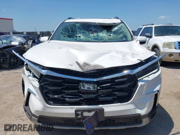 2025 Honda Pilot Touring с VIN 5FNYG2H76SB030457, выставлен на аукционе IAAI как лот 42471743 с пробегом 3 132 миль миль и . История ставок и продаж доступна на DreamBid. Изображение 12.