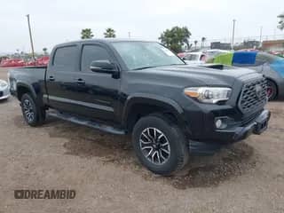 2020 Toyota Tacoma SR5 z VIN 3TMBZ5DN8LM023920, wystawiony jako IAAI lot #42015118 z przebiegiem 46 137 mil mil oraz . Historia ofert i sprzedaży dostępna na DreamBid. Obrazek 1.