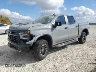 2024 Chevrolet Silverado 1500 ZR2 с VIN 3GCUDHE85RG252676, выставлен на аукционе Copart как лот 71485434 с пробегом Не указан миль и Списание • Salvage title. История ставок и продаж доступна на DreamBid. Изображение 1.