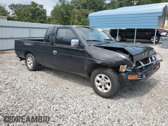 1997 Nissan Frontier XE with VIN 1N6SD16S2VC344377, listed as a Copart auction lot 69907755 with 306,826 mi miles and Salvage title. Bid and sale history available at DreamBid. Image 4.