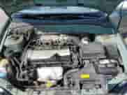 2005 Hyundai Accent GLS z VIN KMHCG45C35U622963, wystawiony jako Copart lot #68292114 z przebiegiem 137 655 mil mil oraz Szkoda całkowita • Salvage title. Historia ofert i sprzedaży dostępna na DreamBid. Obrazek 11.