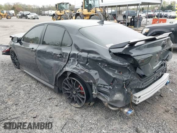 2024 Toyota Camry TRD with VIN 4T1KZ1AK6RU092771, listed as a IAAI auction lot 39123624 with 9,888 mi miles and . Bid and sale history available at DreamBid. Image 3.