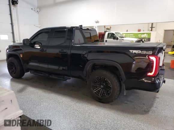 2023 Toyota Tundra SR5 with VIN 5TFLA5DA4PX117463, listed as a Copart auction lot 66035785 with 5,651 mi miles and Clean title. Bid and sale history available at DreamBid. Image 2.