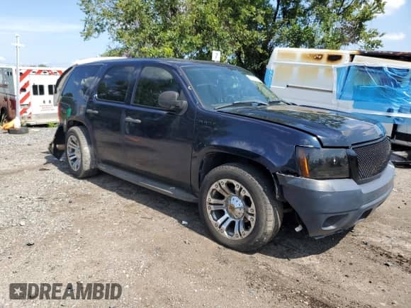2007 Chevrolet Tahoe Police с VIN 1GNEC030X7R390076, выставлен на аукционе Copart как лот 66219415 с пробегом 235 406 миль миль и Списание • Salvage title. История ставок и продаж доступна на DreamBid. Изображение 4.