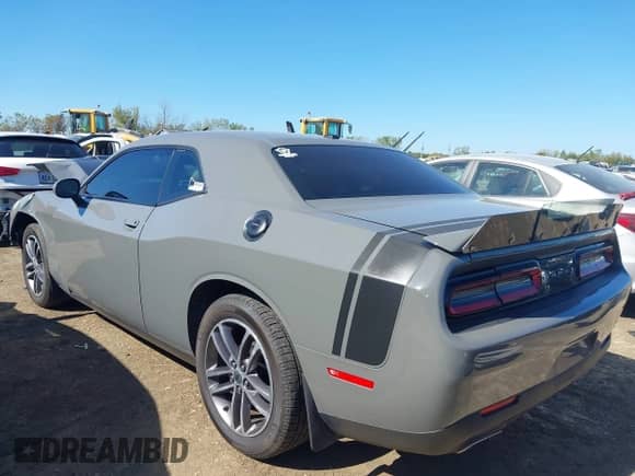 2019 Dodge Challenger SXT with VIN 2C3CDZGG8KH690365, listed as a IAAI auction lot 43363015 with 132,431 mi miles and . Bid and sale history available at DreamBid. Image 3.