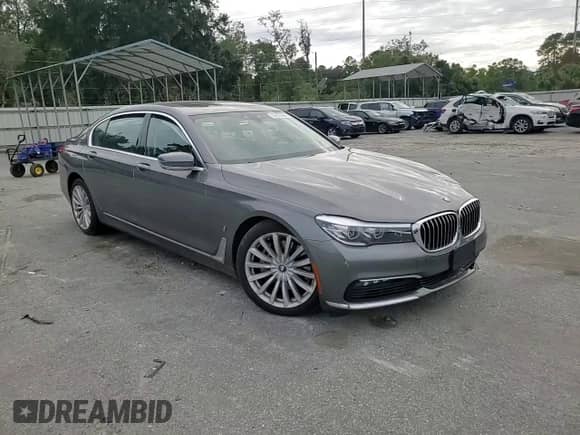 2018 BMW 7 Series 740e xDrive with VIN WBA7J2C51JG938383, listed as a Copart auction lot 74255964 with Not provided miles and Salvage title. Bid and sale history available at DreamBid. Image 11.