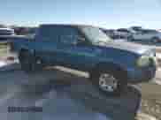 2004 Nissan Frontier XE z VIN 1N6ED27TX4C445952, wystawiony jako Copart lot #88747885 z przebiegiem 136 326 mil mil oraz Nie do naprawy • Non repairable. Historia ofert i sprzedaży dostępna na DreamBid. Obrazek 4.