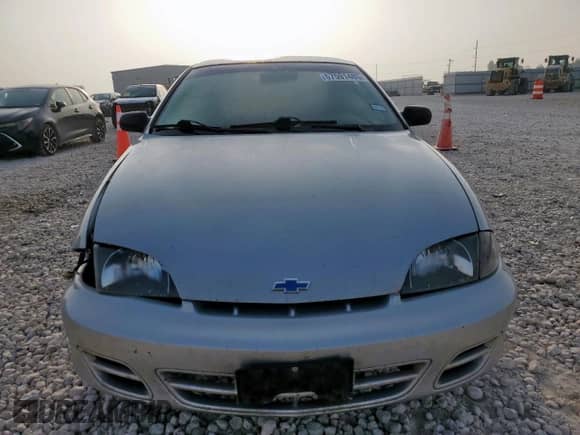 2000 Chevrolet Cavalier with VIN 1G1JC1243Y7363101, listed as a Copart auction lot 57591485 with 252,742 mi miles and Salvage title. Bid and sale history available at DreamBid. Image 5.