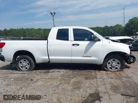 2013 Toyota Tundra z VIN 5TFRU5F14DX029880, wystawiony jako IAAI lot #43081536 z przebiegiem 198 758 mil mil oraz . Historia ofert i sprzedaży dostępna na DreamBid. Obrazek 13.
