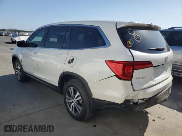 2018 Honda Pilot EX with VIN 5FNYF5H35JB017165, listed as a Copart auction lot 58557435 with 83,302 mi miles and Salvage title. Bid and sale history available at DreamBid. Image 2.