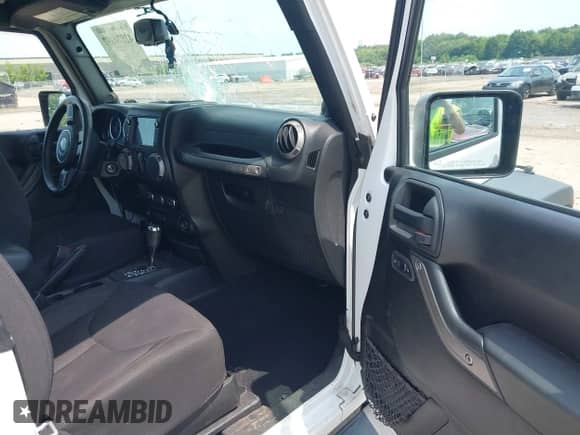 2014 Jeep Wrangler Sport with VIN 1C4AJWAG8EL276335, listed as a IAAI auction lot 42874697 with 115,070 mi miles and . Bid and sale history available at DreamBid. Image 5.