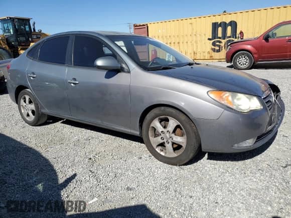 2009 Hyundai Elantra GLS with VIN KMHDU46D89U782833, listed as a Copart auction lot 90264185 with 114,737 mi miles and Salvage title. Bid and sale history available at DreamBid. Image 4.