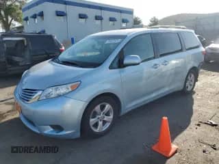 2015 Toyota Sienna LE AAS with VIN 5TDKK3DC7FS591099, listed as a Copart auction lot 65522525 with 174,792 mi miles and Salvage title. Bid and sale history available at DreamBid. Image 1.