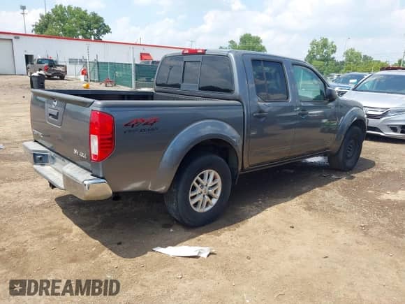 2016 Nissan Frontier SV with VIN 1N6AD0EVXGN796733, listed as a IAAI auction lot 42538622 with 135,298 mi miles and . Bid and sale history available at DreamBid. Image 4.