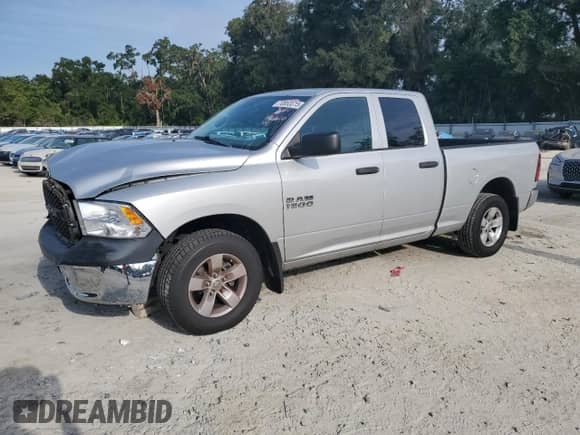 2014 Ram 1500 Tradesman с VIN 1C6RR6FG0ES100557, выставлен на аукционе Copart как лот 70853315 с пробегом 125 637 миль миль и Списание • Salvage title. История ставок и продаж доступна на DreamBid. Изображение 1.