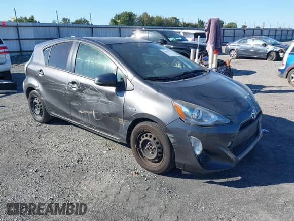 2015 Toyota Prius Two z VIN JTDKDTB36F1107644, wystawiony jako IAAI lot #43403795 z przebiegiem 210 092 mil mil oraz . Historia ofert i sprzedaży dostępna na DreamBid. Obrazek 1.