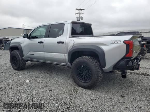 2024 Toyota Tacoma SR5 with VIN 3TYLB5JN8RT060119, listed as a Copart auction lot 83873505 with 25 mi miles and Salvage title. Bid and sale history available at DreamBid. Image 2.