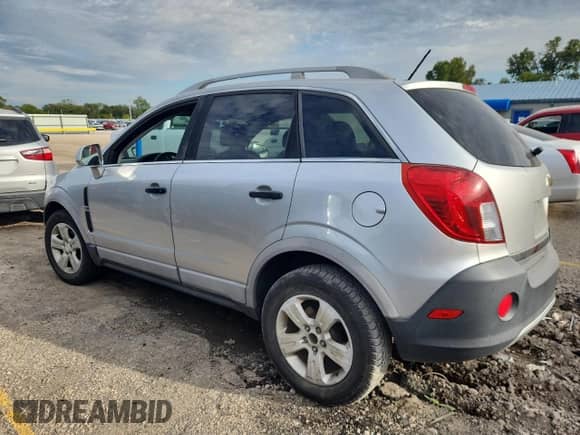 2014 Chevrolet Captiva Sport LS с VIN 3GNAL1EK6ES613551, выставлен на аукционе Copart как лот 81738865 с пробегом 127 424 миль миль и Списание • Salvage title. История ставок и продаж доступна на DreamBid. Изображение 2.