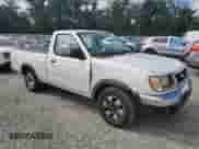 1998 Nissan Frontier XE z VIN 1N6DD21SXWC387985, wystawiony jako Copart lot #84769815 z przebiegiem 184 959 mil mil oraz Szkoda całkowita • Salvage title. Historia ofert i sprzedaży dostępna na DreamBid. Obrazek 4.