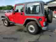 2000 Jeep Wrangler SE with VIN 1J4FA29P8YP711686, listed as a Copart auction lot 68999455 with 100,108 mi miles and Salvage title. Bid and sale history available at DreamBid. Image 2.