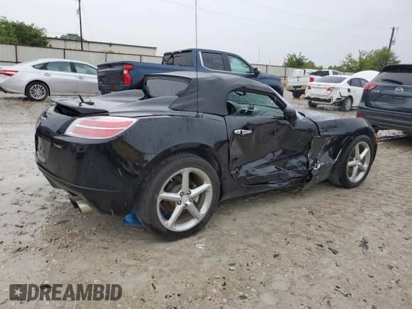 2009 Saturn Sky Red Line with VIN 1G8MG35X39Y106052, listed as a Copart auction lot 69893854 with 124,937 mi miles and Salvage title. Bid and sale history available at DreamBid. Image 3.