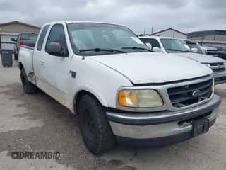 2002 Ford F-150 XL with VIN 1FTRX07262KB49014, listed as a IAAI auction lot 41518904 with Not provided miles and . Bid and sale history available at DreamBid. Image 1.