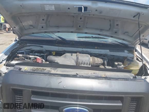 2012 Ford Econoline Cargo Commercial with VIN 1FTNS2EL0CDB20067, listed as a IAAI auction lot 42858350 with 127,126 mi miles and . Bid and sale history available at DreamBid. Image 10.