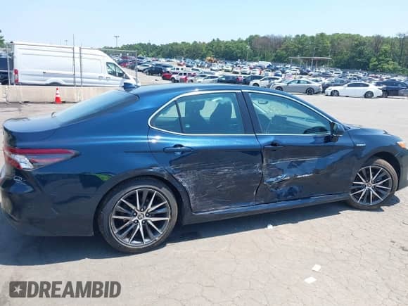2021 Toyota Camry Hybrid XLE with VIN 4T1F31AK3MU554067, listed as a IAAI auction lot 42681018 with 53,630 mi miles and . Bid and sale history available at DreamBid. Image 6.