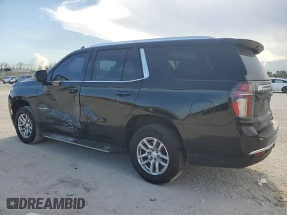 2022 Chevrolet Tahoe LS z VIN 1GNSCMKD4NR202986, wystawiony jako Copart lot #63980165 z przebiegiem 74 127 mil mil oraz Szkoda całkowita • Salvage title. Historia ofert i sprzedaży dostępna na DreamBid. Obrazek 2.