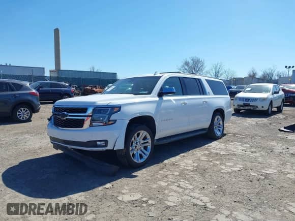 2016 Chevrolet Suburban LS z VIN 1GNSKGEC7GR276512, wystawiony jako IAAI lot #41892524 z przebiegiem 182 659 mil mil oraz . Historia ofert i sprzedaży dostępna na DreamBid. Obrazek 2.