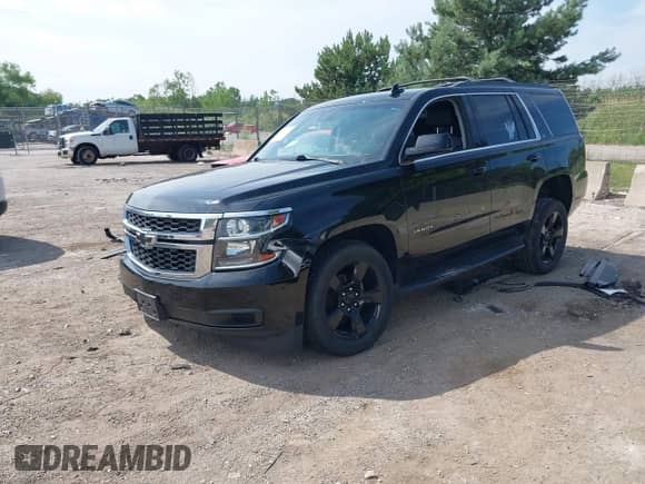 2018 Chevrolet Tahoe LT z VIN 1GNSKBKC7JR235456, wystawiony jako IAAI lot #42685297 z przebiegiem 92 816 mil mil oraz . Historia ofert i sprzedaży dostępna na DreamBid. Obrazek 17.