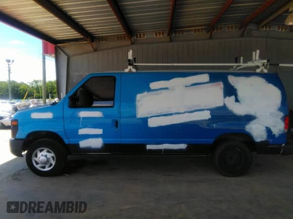 2014 Ford Econoline Cargo Commercial with VIN 1FTNE1EW9EDA70011, listed as a IAAI auction lot 37021285 with 244,383 mi miles and . Bid and sale history available at DreamBid. Image 14.