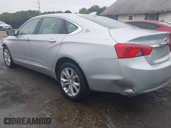 2018 Chevrolet Impala LT with VIN 2G1105S34J9108310, listed as a IAAI auction lot 43037616 with 113,873 mi miles and . Bid and sale history available at DreamBid. Image 3.