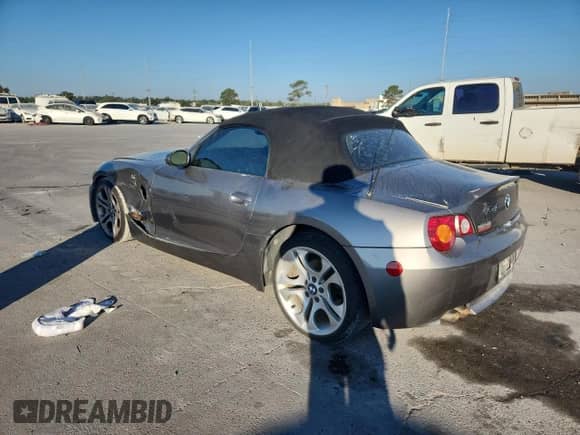 2004 BMW Z4 3.0i with VIN 4USBT53564LT25710, listed as a Copart auction lot 80996885 with 80,517 mi miles and Salvage title. Bid and sale history available at DreamBid. Image 2.