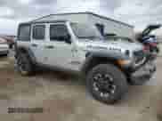 2024 Jeep Wrangler Rubicon z VIN 1C4RJXR69RW255776, wystawiony jako Copart lot #81444315 z przebiegiem 11 461 mil mil oraz Szkoda całkowita • Salvage title. Historia ofert i sprzedaży dostępna na DreamBid. Obrazek 4.